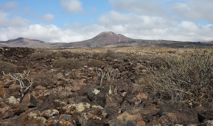 Volcanic landscape with the volcano of the Crown, Lanzarote, Canary Islands, Spain