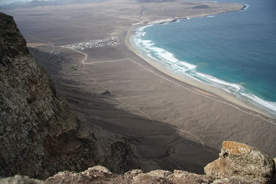 Playa de Famara and the Famara houses seen from the Risco de Famara cliffs
