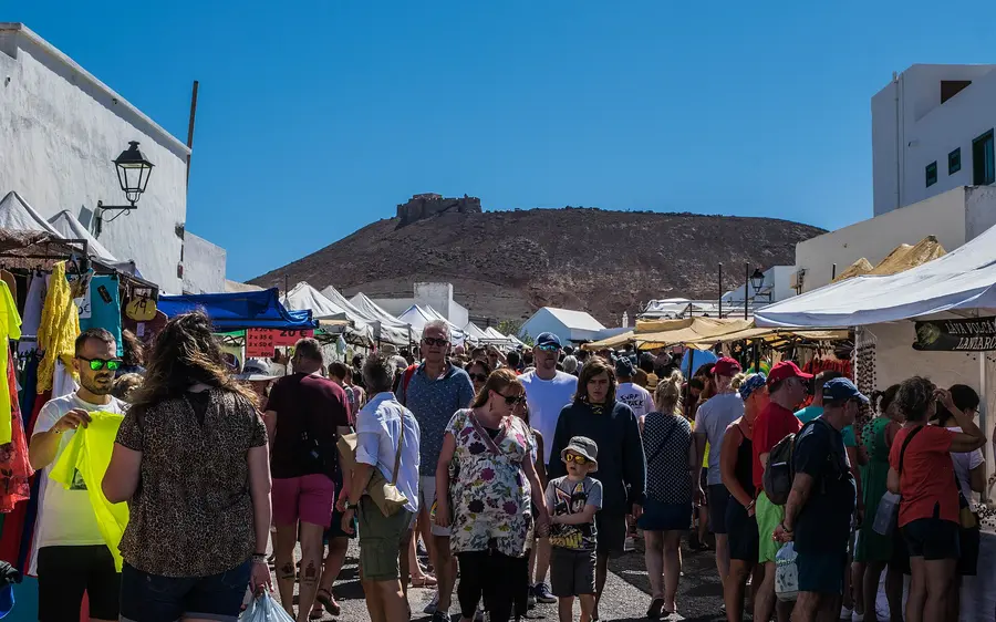 Market stalls and crowds in the streets of Teguise, Lanzarote